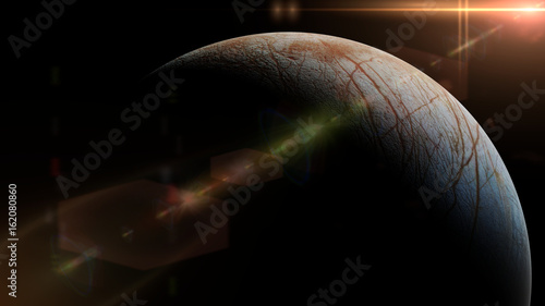 Fototapeta Naklejka Na Ścianę i Meble -  Europa, moon of the planet Jupiter lit by the Sun