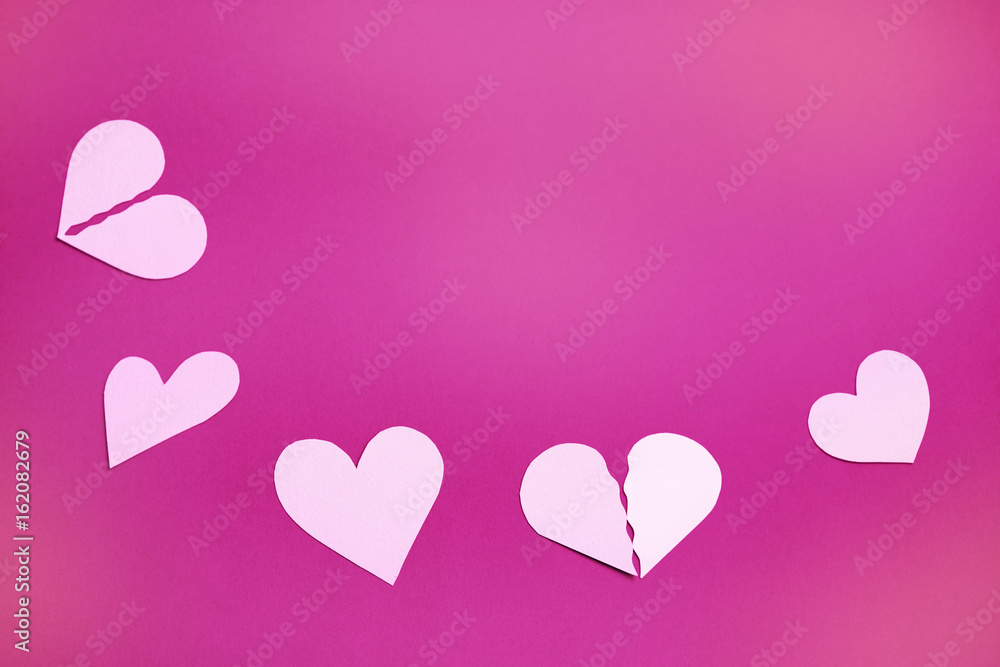Gentle pink hearts on a purple background and copy space