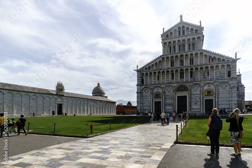 Facade of the Duomo and the cemetery in Pisa in Italy