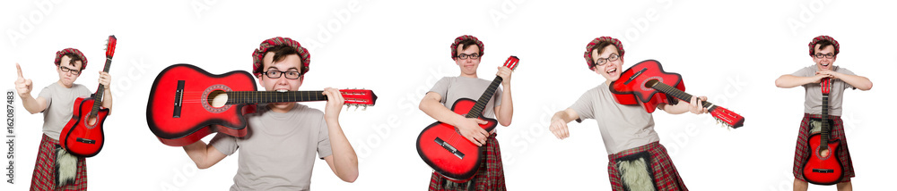 Scotsman playing guitar isolated on white Scotsman playing guitar isolated on white