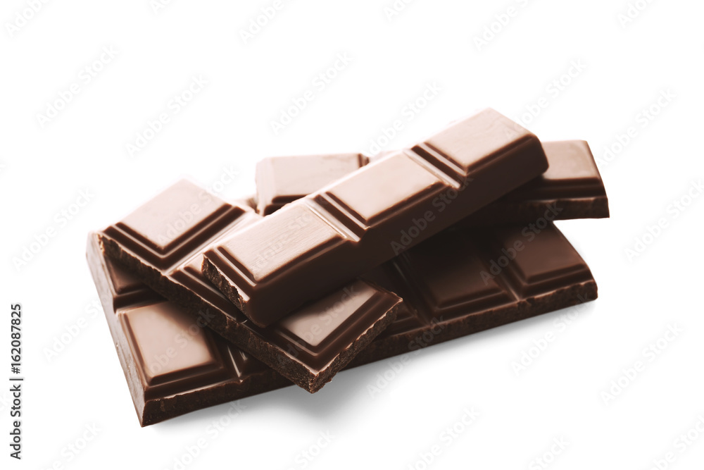 Broken chocolate pieces, isolated on white Broken chocolate pieces, isolated on white
