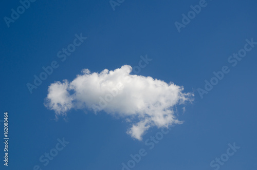 One easy cloudlet against the background of a blue clear sky.