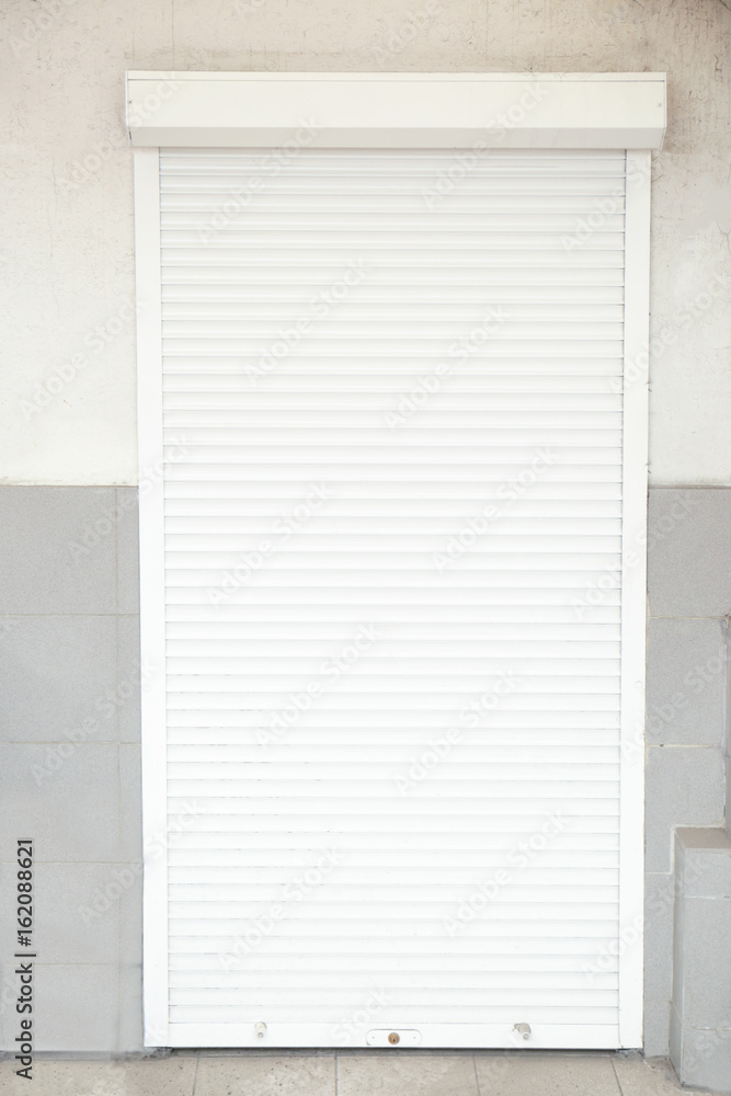 Fototapeta premium Building with closed roller door