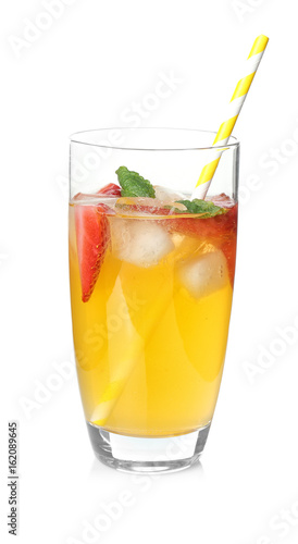 Glass with delicious lemonade on white background
