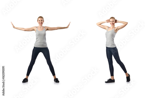 Young woman doing sports isolated on white © Elnur