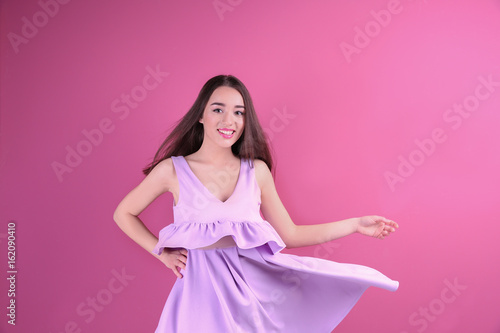 Beautiful young woman in li...