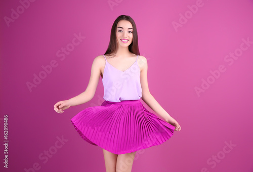 Beautiful young woman in li...