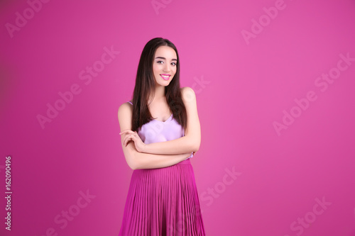 Beautiful young woman in li...