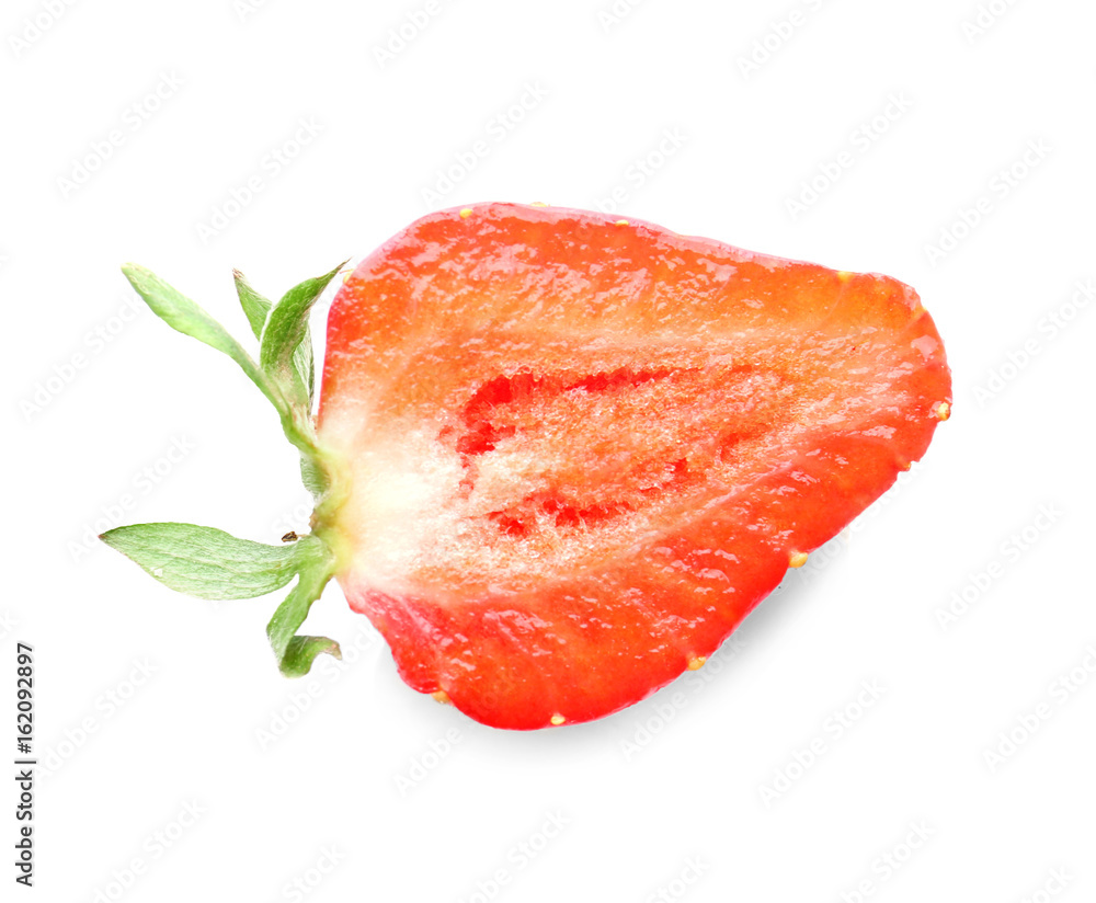 Half of tasty red strawberry on white background, closeup