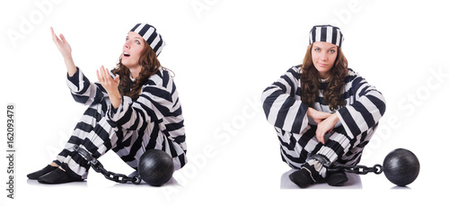 Prisoner in striped uniform on white