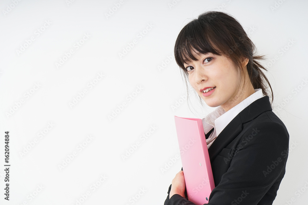 Young woman having some documents at office Young woman having some documents at office