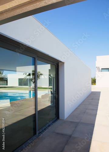 view of a modern house with pool © kanashe_yuliya