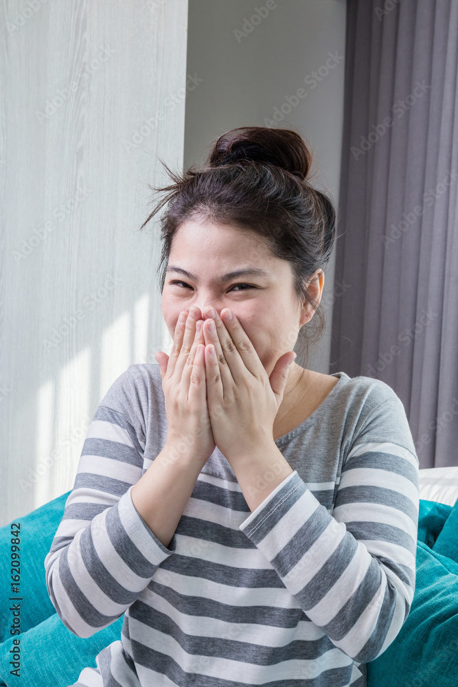 beautiful cute asian girl with moment of wonderful surprise on cozy and casual sofa in bedroom with daylight image tone beautiful cute asian girl with moment of wonderful surprise on cozy and casual sofa in bedroom with daylight image tone