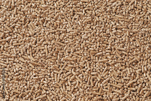 Wood pellets - close-up, background, cheap energy.