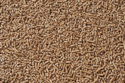 Wood pellets - close-up, background, cheap energy.