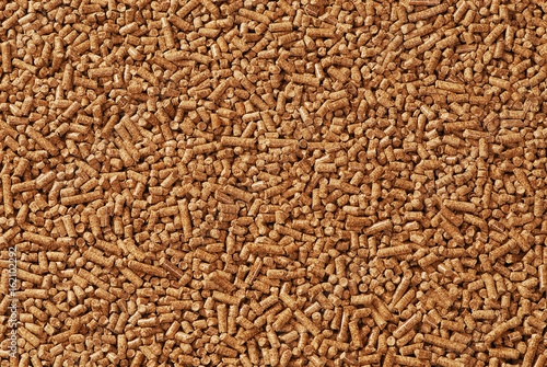 Wood pellets - close-up, background, cheap energy.