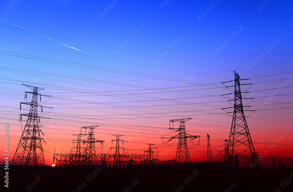 Fototapeta premium High piezoelectric towers, in the setting sun