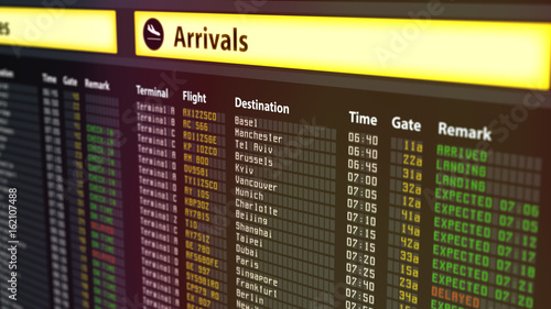 Airport timetable arrivals and departures board with changing flight information 