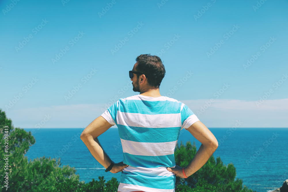 Modern man enjoying on the beach. Modern man enjoying on the beach.