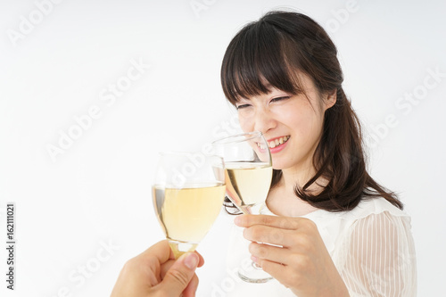 Young woman drinking wine