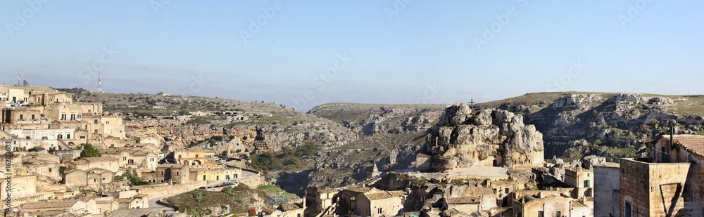 Panorama of Matera: the lost city Sassi on the left and the rock church of Madonna de Idris on the right, Puglia, Italy. (large stitched file)