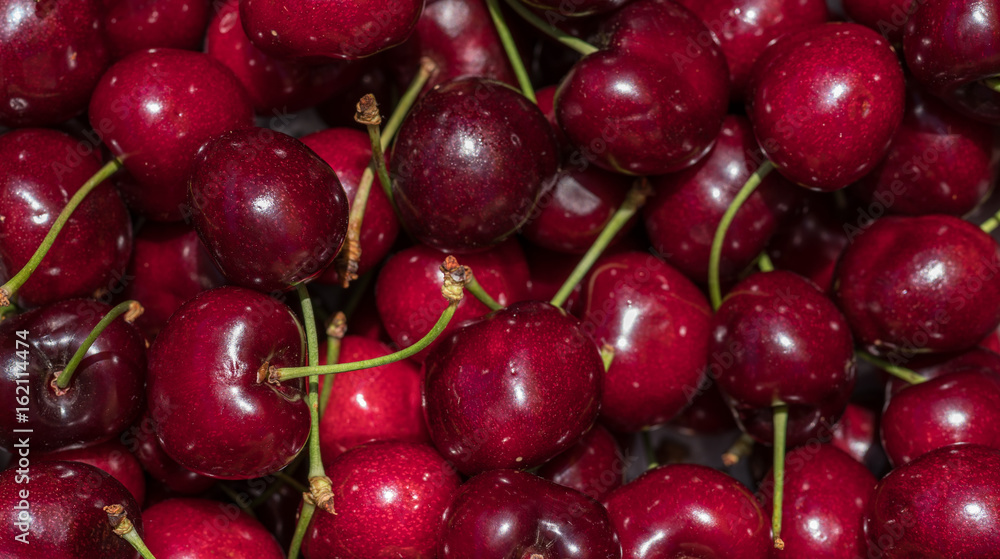 cherry detail macro of delicious fresh ripe red cherries with bright green stem, perfect food background Sweet cherry background. Cherry from Bolea Aragon Huesca Spain cherry detail macro of delicious fresh ripe red cherries with bright green stem, perfect food background Sweet cherry background. Cherry from Bolea Aragon Huesca Spain