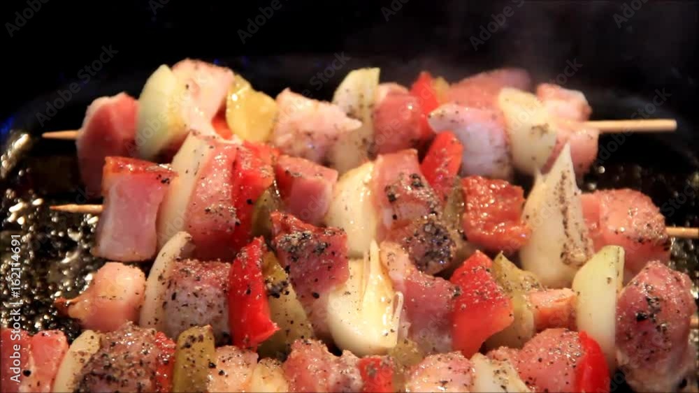 cooking meat and vegetables in a pan, shashlik kebabs
cooking meat and vegetables in a pan, shashlik kebabs