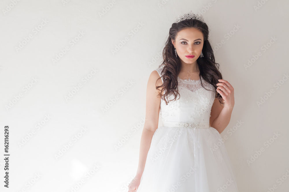 bride in white wedding dress in a roomf wedding