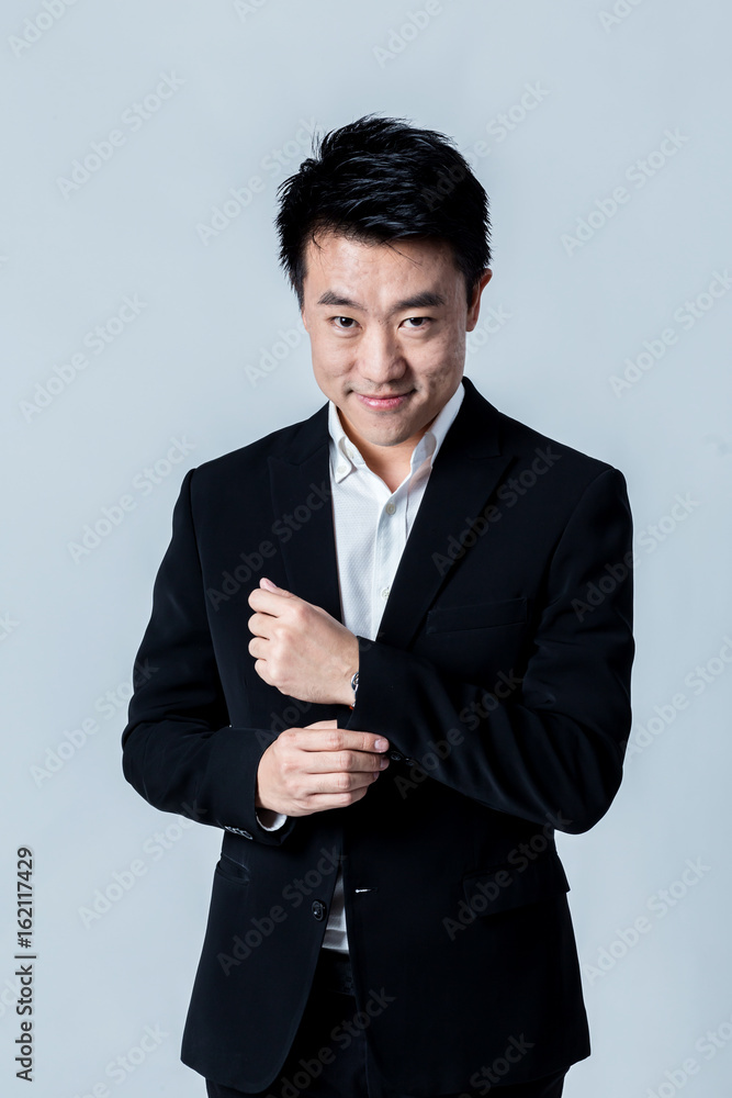 studio portrait of an asian businessman. studio portrait of an asian businessman.