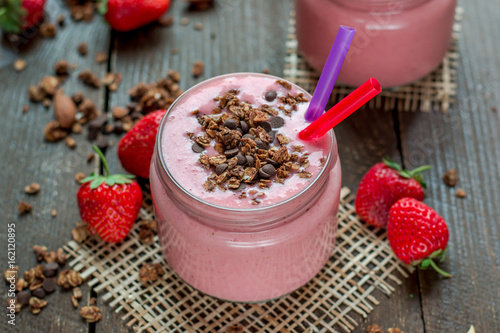 Smoothie in a jar with a straw 