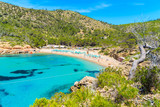 View of Cala Benirras beach with turquoise sea water, Ibiza island, Spain