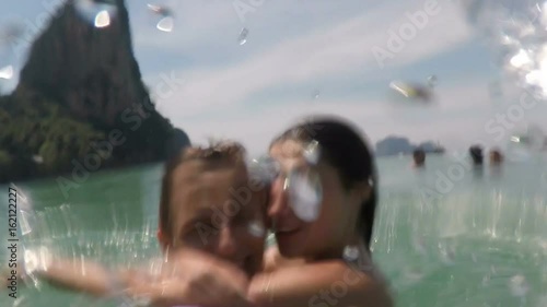 Couple Kissing And Spinning In Water On Sea POV, Young Man And Woman Tourists In Love On Summer Seaside Vacation