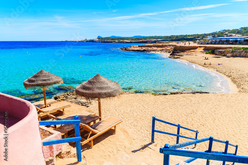 Steps from coastal bar to Cala Comte beach, Ibiza island, Spain