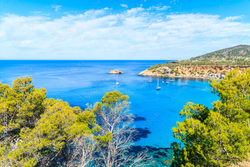 View of Cala d'Hort bay with beautiful azure blue sea water, Ibiza island, Spain