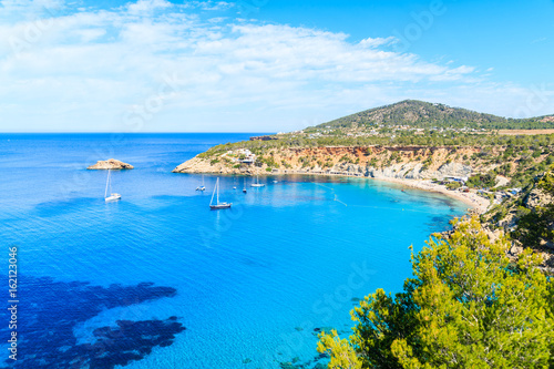 View of Cala d'Hort bay with beautiful azure blue sea water, Ibiza island, Spain