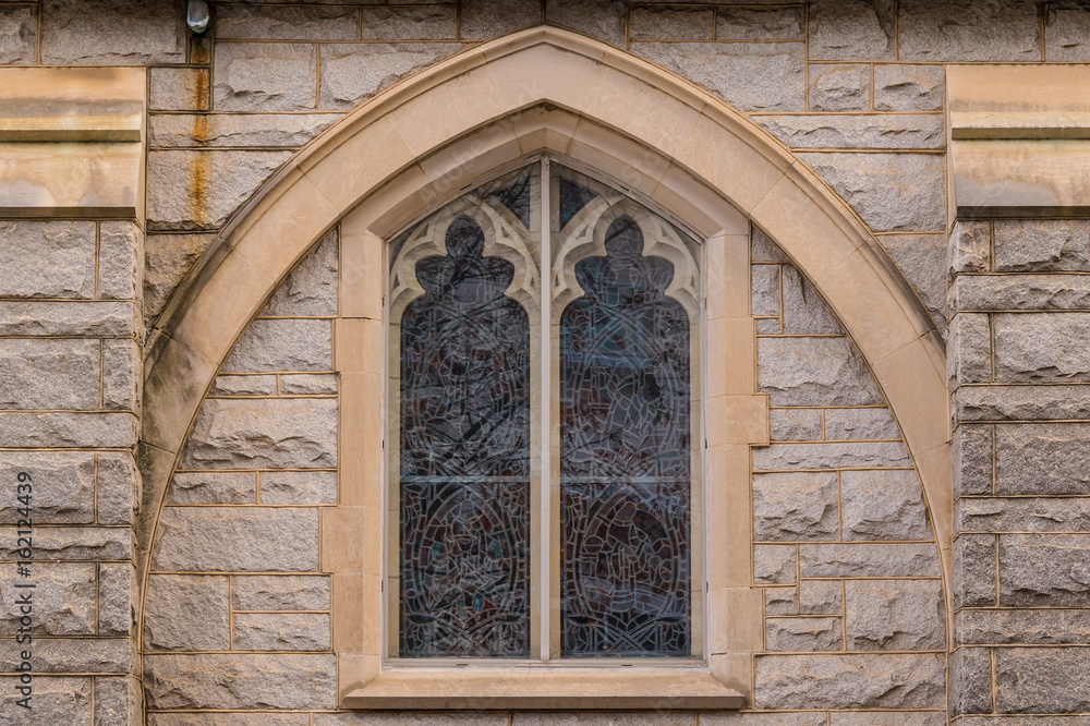 One window on the facade of Saint Mark United Methodist Church front view, Atlanta, USA