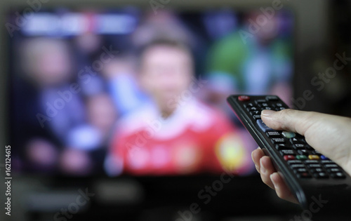 Female watching football photo