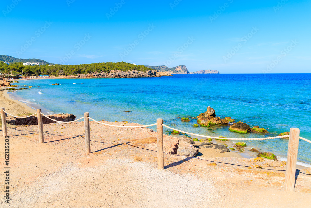 Obraz premium View of Cala Nova beach on sunny summer day, Ibiza island, Spain