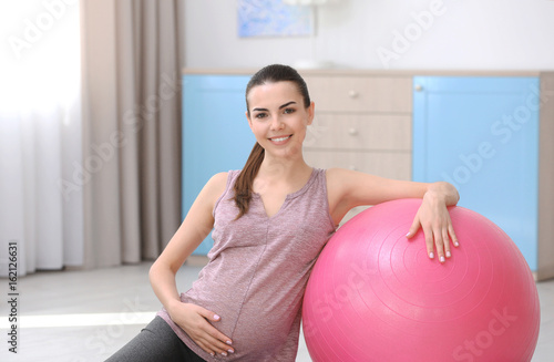 Beautiful pregnant woman do...
