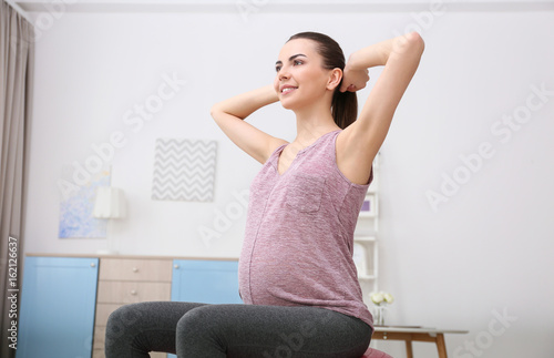 Beautiful pregnant woman do...