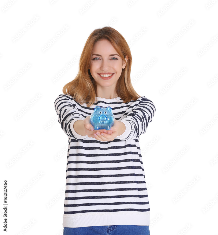 Happy young woman holding piggy bank on white background Happy young woman holding piggy bank on white background