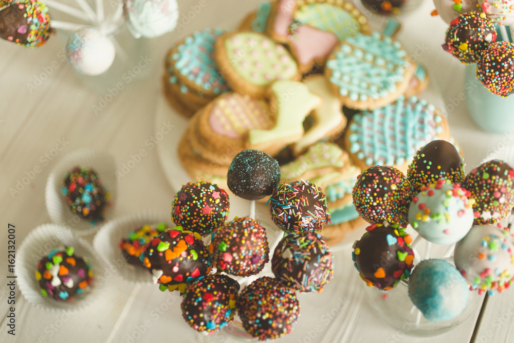 Cake pops decorated by colorful sprinkles
