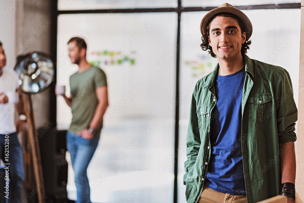 Cheerful male worker expressing positive emotions Cheerful male worker expressing positive emotions