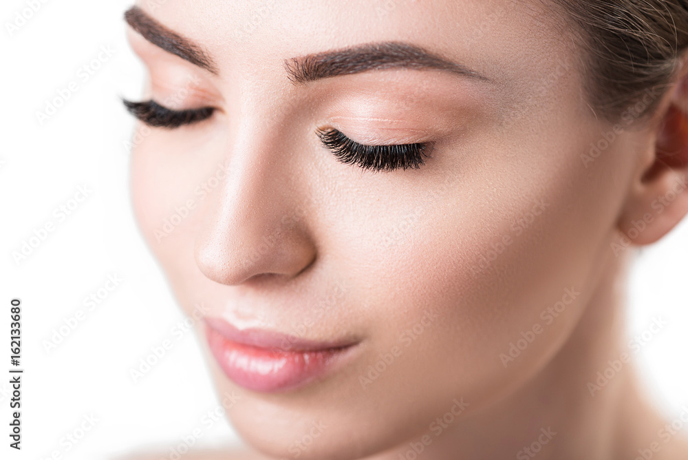Cheery beautiful girl enjoying using cosmetics Cheery beautiful girl enjoying using cosmetics