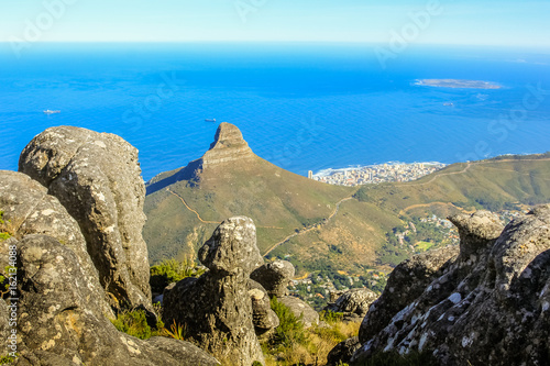 Table Mountain National Park, Trail Hike. The plateau, flanked by Devil's Peak to the east and by Lion's Head to the west, forms a backdrop to Cape Town. photo