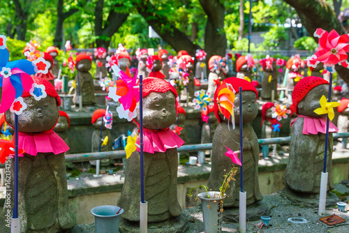 Old jizo statues in temple, Tokyo photo