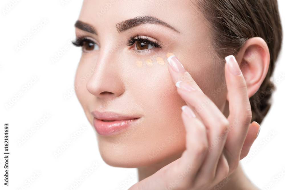 Happy attractive girl enjoying using make-up Happy attractive girl enjoying using make-up