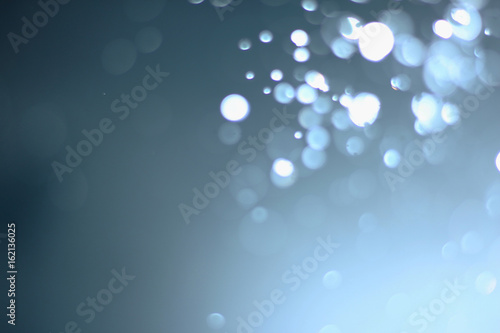 A beautiful and blurry bokeh on a blue background.