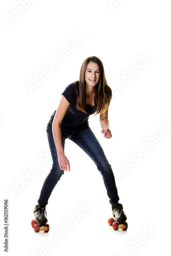 teen girl trying to roller skate