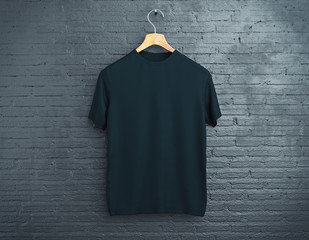 Black t-shirt on brick background